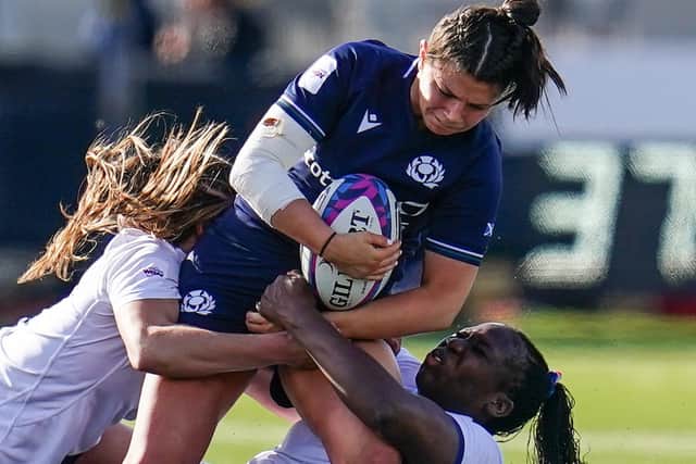 Lisa Thomson being tackled by France's Axelle Berthoumieu and Madoussou Fall at Edinburgh's Hive Stadium last month (Photo by Peter Summers/Getty Images)
