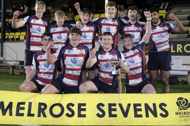 Peebles Colts celebrating winning the under-18s' shield on Friday at Melrose Sevens after beating Selkirk Youth Club 36-5