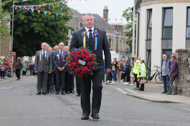 Ex Standard bearers chairman Scott Tomlinson makes his way to lay the wreath at the Flodden Memorial.