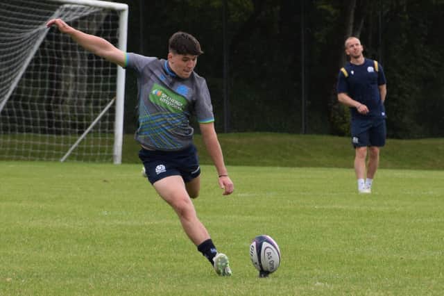 Borders player Cammy Scott, the only Scottish name to make the scoresheet last week against Italy, is dropped for today's U20 Six Nations rugby match against France. in the background is assistant defence coach Ciaran Beattie of Selkirk (picture by Scottish Rugby).