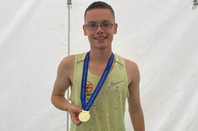 Hawick runner Thomas MacAskill with the half-mile grass-track championship medal he won at Lochcarron Highland Games in the summer