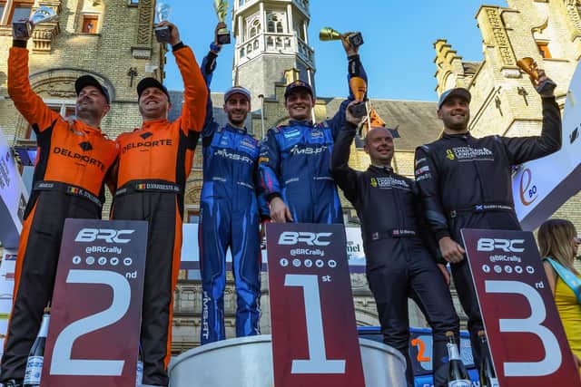 Duns driver Garry Pearson and co-driver Daniel Barritt, far right, celebrating finishing third at this year's Ypres Rally, behind winners Adrien Fourmaux and Alexandre Coria and runners-up Davy Vanneste and Kris D'alleine (Pic: JEP/British Rally Championship)