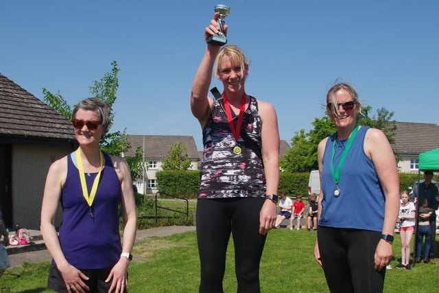 Suzanne MacVicar, winner of St Boswells village race's class for women over the age of 40, with runner-up Clare Townsend and third-placed Judith Folan