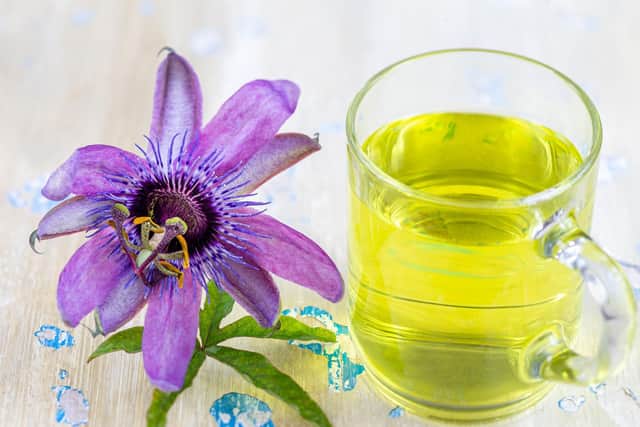 Passionflower flower infused in a glass cup is another sleep aid (photo: Adobe)