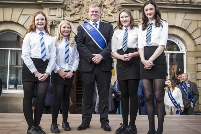 Melissa Paxton and Eden Hewitt from Edenside Primary School with Scarlett Forsyth and Skylar Nicolson from Broomlands Primary School begin their duties as Lady Bussers with the new Kelso Laddie for 2022, Callum Davidson. Photo: Bill McBurnie.
