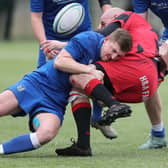 Matthew Mallin getting a tackle in during Hawick Linden's 38-14 win at home to Duns at the town's Volunteer Park in round one of Scottish rugby's national shield on Saturday (Photo: Brian Sutherland)