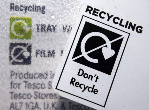 A 'Don't Recycle' label on plastic packaging.