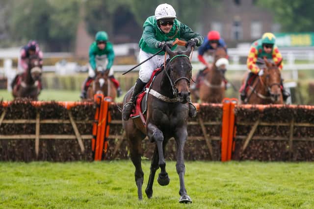 ESHER, ENGLAND - APRIL 28:   Nico de Boinville riding Call Me Lord clear the last to win The bet365 Select Hurdle Race at Sandown Park racecourse on April 28, 2018 in Esher, England. (Photo by Alan Crowhurst/Getty Images)