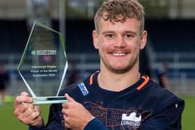 Darcy Graham with September's Edinburgh player of the month award (Pic: Ross Parker/SNS Group/SRU)