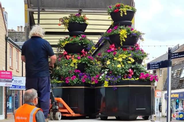 Some of the new planters being put in place in Galashiels' Channel Street and Douglas Bridge.