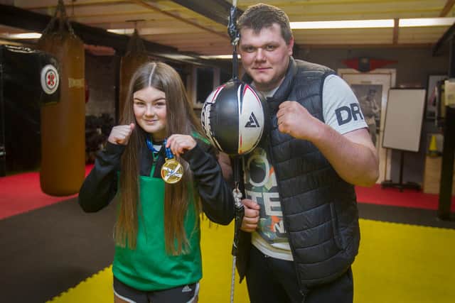 Hawick boxer Rosie Swailes with Dylan Greig, one of her trainers (Photo: Bill McBurnie)
