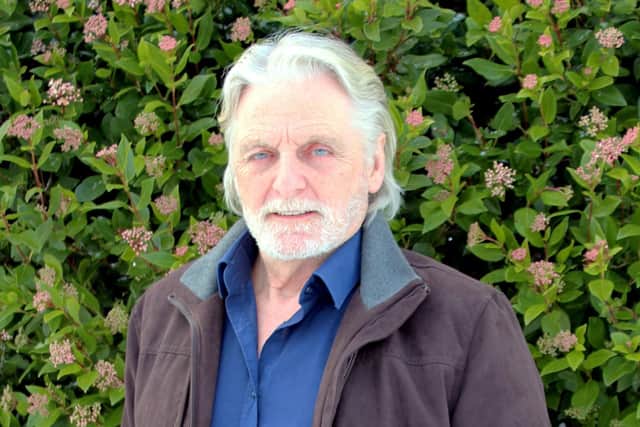 Councillor John PatonDay.
