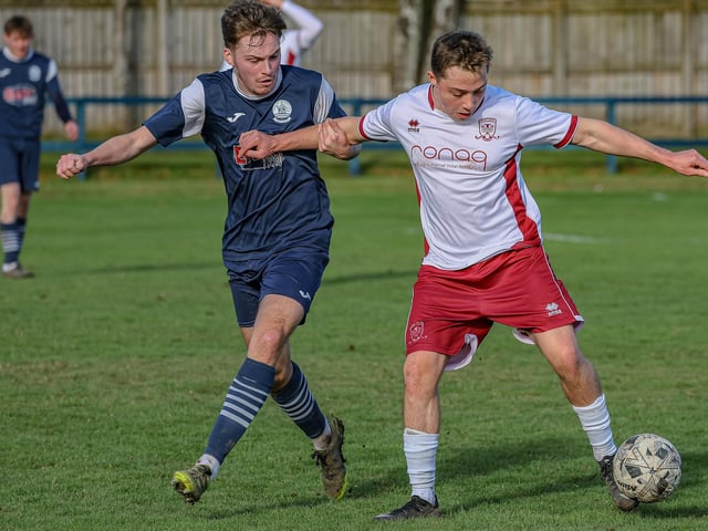 Ross Nicholson defending for Vale of Leithen during their 3-2 loss at home to Tynecastle at Victoria Park in Innerleithen on Saturday (Photo: Hilary Isaac)