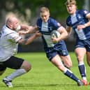 Heriot's Seamus Smith fending off Southern Knights tighthead prop Zenon Szwagrzak during the Borderers' 31-17 away loss at Edinburgh's Goldenacre playing fields on Saturday as their third and final Fosroc Super Series Sprint campaign nears its end (Photo: Malcolm Mackenzie)