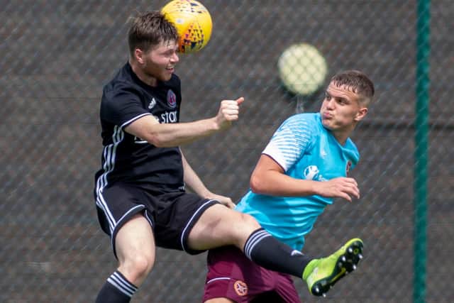 Ceiren Chalmers winning an aerial battle for Gala Fairydean Rovers while playing a Hearts XI yesterday (Photo: Thomas Brown)