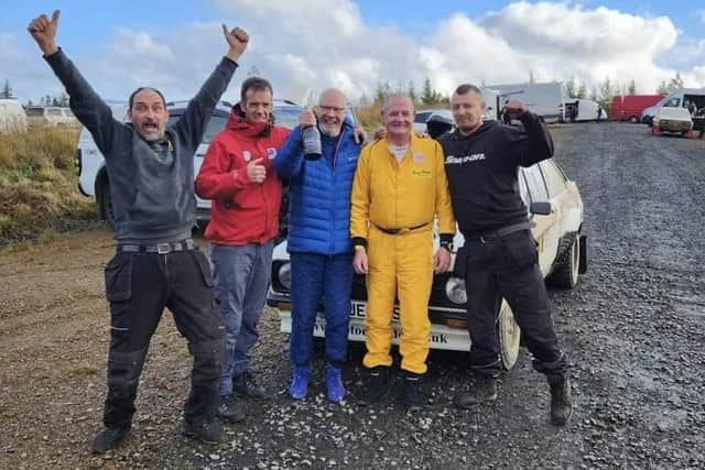Alistair Brearley, centre, celebrating his double Motorsport UK Scottish Rally Championship success