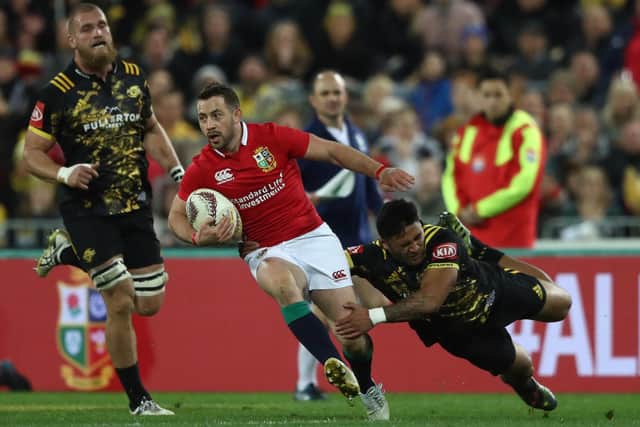 Greig Laidlaw being tackled by Vince Aso during the match between the Hurricanes and the British and Irish Lions at the Westpac Stadium on June 27, 2017, in Wellington, New Zealand (Photo by David Rogers/Getty Images)