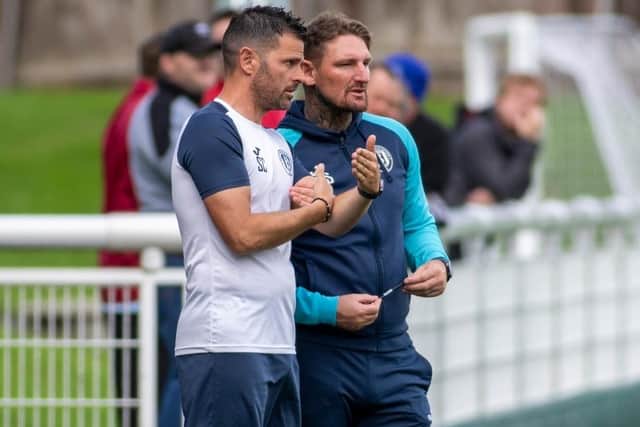 Gala Fairydean Rovers manager Martin Scott and assistant Stevie Craig watching their side beating Newtongrange Star 3-0 at home in a pre-season friendly on Saturday (Photo: Thomas Brown)