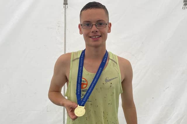 Hawick runner Thomas MacAskill with the half-mile grass-track championship medal he won at Lochcarron Highland Games on Saturday