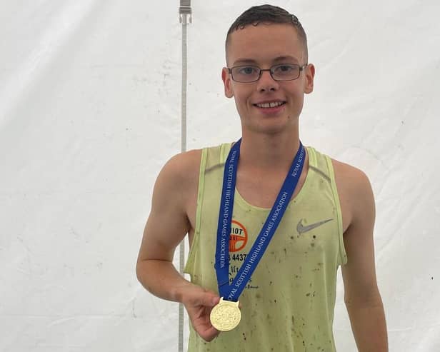 Hawick runner Thomas MacAskill with the half-mile grass-track championship medal he won at Lochcarron Highland Games on Saturday