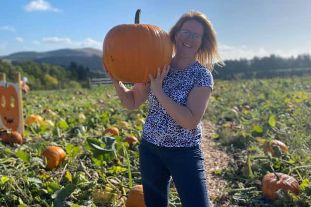 Sally with one of her prize pumpkins