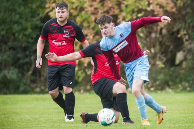 Siris Davidson on the ball for St Boswells against Hawick Colts at the weekend (Photo: Bill McBurnie)