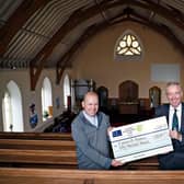 Eyemouth Parish Church minister Andy Haddow with Gareth Baird, Fallago Environment Fund.. Photo: Paul Dodds.