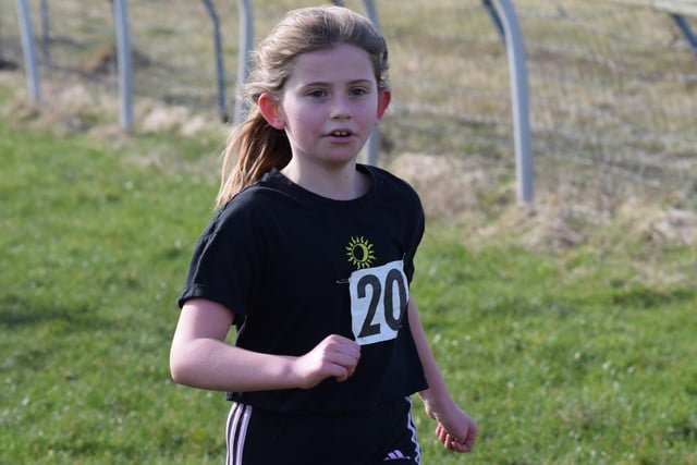 Ellie Potts won Teviotdale Harriers' 2023 cup race for girls under 11 and 13 at the age of nine