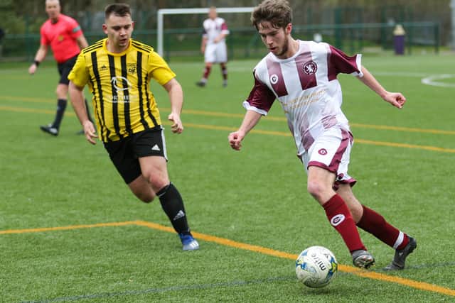 Langlee Amateurs' Graeme Clark on the attack at Langholm Legion at the weekend (Pic: Brian Sutherland)