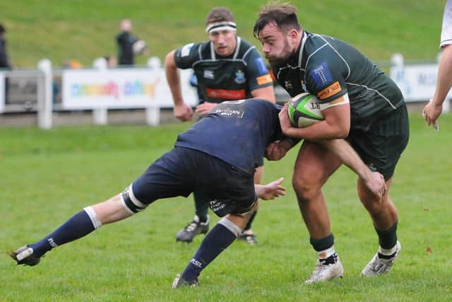 Hawick captain Shawn Muir being halted during the Greens' 36-8 win at home at Mansfield Park to Selkirk on Saturday (Photo: Grant Kinghorn)