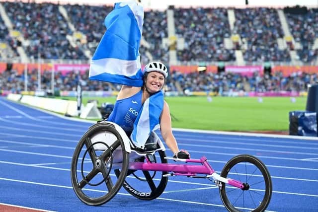 Bronze medallist Samantha Kinghorn celebrating after the para-women's 1,500m T53/T54 final at the Alexander Stadium in Birmingham on day seven of the 2022 Commonwealth Games last night (Photo by Glyn Kirk/AFP via Getty Images)
