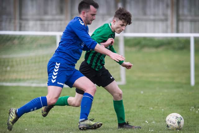 Rory Banks on the ball for hosts Selkirk Victoria against Hawick Legion at the weekend, a B division match the former won 3-2 (Photo: Bill McBurnie)