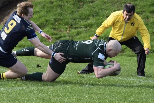Gareth Welsh scoring a try during Hawick's 36-0 Scottish cup quarter-final win at Dundee on Saturday (Photo: Malcolm Grant)