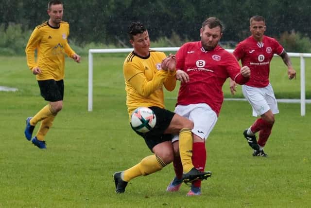 Peebles Rovers goal-scorer Paul Dickson challenging for possession on Friday (Pic: Pete Birrell)