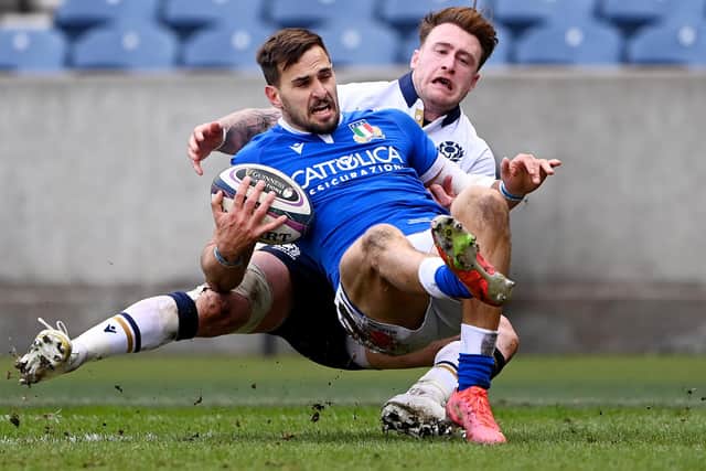 Mattia Bellini being tackled by Hawick's Stuart Hogg during March's Guinness Six Nations match between Scotland and Italy at Murrayfield in Edinburgh (Photo by Stu Forster/Getty Images)
