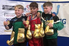 From left, Ivan, Mason and Max with their Golden Gloves (Submitted pic)