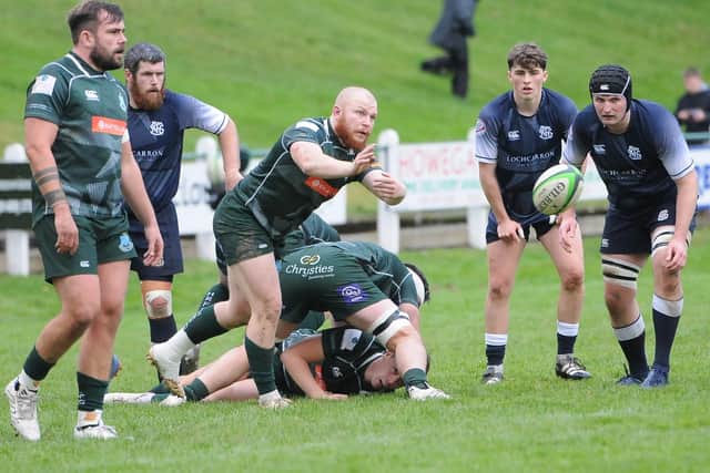 Gareth Welsh making a pass for Hawick during their 36-8 win at home to Selkirk at Mansfield Park on Saturday (Photo: Grant Kinghorn)
