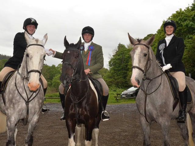 Selkirk Standard Bearer Adam Nichol extends the hand of friendship to Braw Lad John Turnbull and Braw Lass Abbie Hood. Photos: Alwyn Johnston.