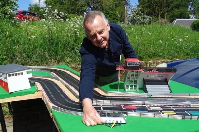 Connal McIlwraith sets up one of his track layouts.