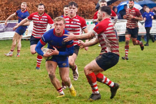Peebles on the defensive against Kirkcaldy's Callum Kennedy during their 24-20 win in Fife on Saturday (Photo: Michael Booth)