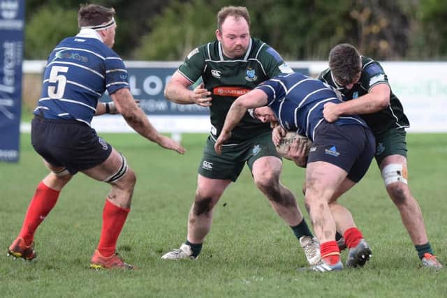 Hawick's Stuart Graham getting a tackle in against Musselburgh (Pic: Malcolm Grant)
