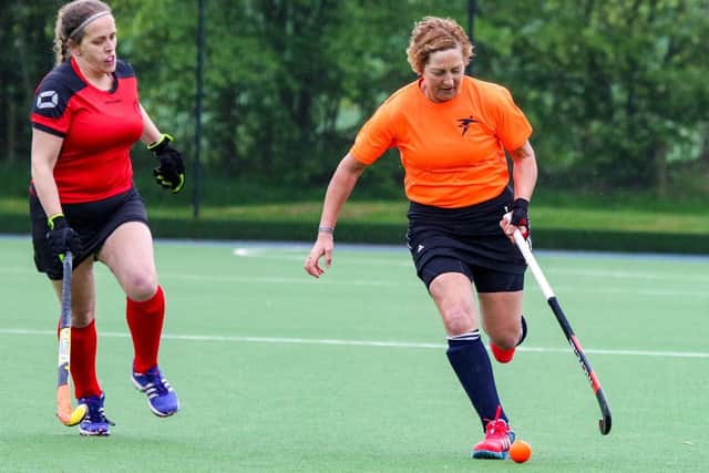 Janet Jack, right, in action on a hockey pitch in 2019