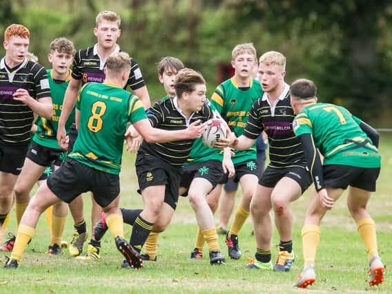 Hamish Derrick on the ball for Melrose Wasps against Selkirk Youth Club on Saturday (Photo: Bill McBurnie)