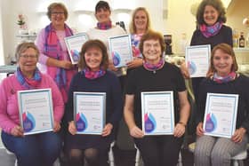 The Selkirk CRUK committee pictured with their awards. Back row: Elaine Monro, Catherine Inglis, Paula Kellett, Mary Smail. Seated: Fiona Holmes, Donella McCann, Margery Inglis (chair) and Judith Davies. Absent – Joyce Wright & Karen Findlater.