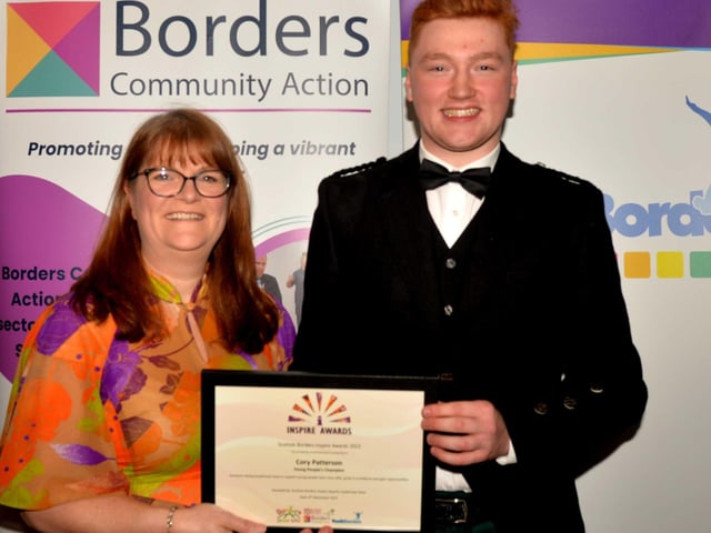 Young Peoples Champion Cory Paterson is presented his award by Haylis Smith.