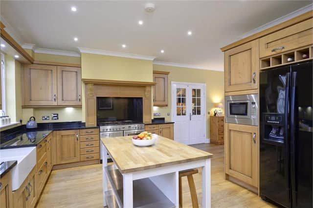 The open plan kitchen and dining room is a great feature of this family home.