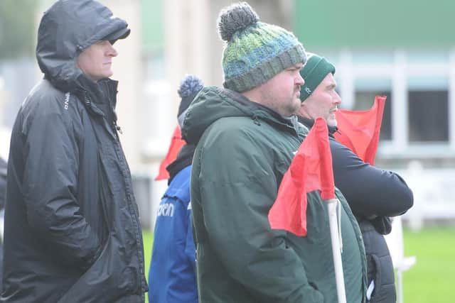 From left, assistant coach Scott MacLeod, director of rugby Gary Muir and interim head coach Graham Hogg watching Hawick's 16-3 Scottish cup semi-final win at home to Currie Chieftains at Mansfield Park in April (Photo: Grant Kinghorn)