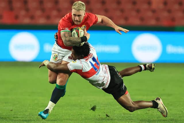 Stuart Hogg being tackled by Rabz Maxwane of Sigma Lions on Saturday (Photo by David Rogers/Getty Images)
