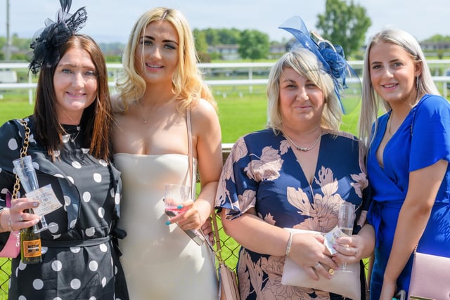 Four race-goers at Kelso's ladies' day season finale on Sunday