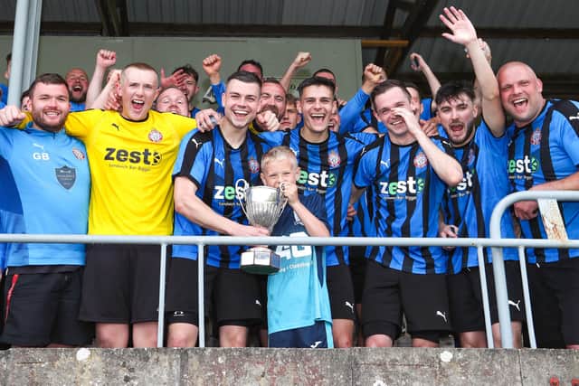 Biggar United celebrating their 4-0 Walls Cup final win against Hawick Legion in Hawick on Saturday (Pic: Brian Sutherland)